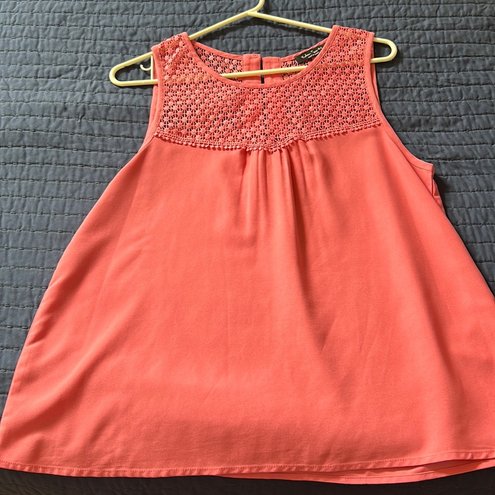 Coral sleeveless blouse